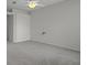 Bedroom featuring carpeting, a ceiling fan, and neutral wall colors at 15569 Burbank Dr, Brooksville, FL 34604
