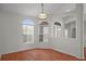 Bright dining area features wood floors and an open archway to the entry at 15569 Burbank Dr, Brooksville, FL 34604