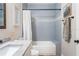 Bathroom featuring a tiled bathtub and a vanity sink with a framed mirror at 1601 E 98Th Ave, Tampa, FL 33612
