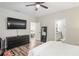 Modern bedroom with a black dresser, and a closet at 1601 E 98Th Ave, Tampa, FL 33612