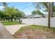 Gated property with fence for privacy and security, plus paved entry at 1601 E 98Th Ave, Tampa, FL 33612