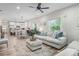 Spacious living room open to the kitchen and dining area, perfect for entertaining at 1601 E 98Th Ave, Tampa, FL 33612
