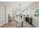 Spacious and bright open-concept kitchen and dining area with modern finishes at 1601 E 98Th Ave, Tampa, FL 33612