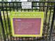 Bexley community's Avid Bike Park rules on a green and white sign at 17316 Cruiser Bnd, Land O Lakes, FL 34638