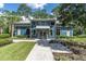 The fitness center is an inviting building with lush landscaping and a convenient bicycle rack at 17316 Cruiser Bnd, Land O Lakes, FL 34638