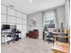 Office space with dual monitors, grey paint, and storage at 17316 Cruiser Bnd, Land O Lakes, FL 34638