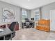 Spacious office with modern desks, ergonomic chairs, and natural light; work-from-home ready at 17316 Cruiser Bnd, Land O Lakes, FL 34638