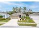 Lovely single-Gathering home with well-maintained lawn and colorful landscaping at 17679 Garsalaso Cir, Brooksville, FL 34604