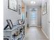 Welcoming foyer with decorative accents and neutral color scheme at 17679 Garsalaso Cir, Brooksville, FL 34604