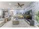 Open-concept living room with contemporary design and ample space for entertaining at 17679 Garsalaso Cir, Brooksville, FL 34604