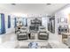 Spacious open layout features a living area with large windows and a combined kitchen and dining space at 17679 Garsalaso Cir, Brooksville, FL 34604