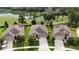 Aerial view of a lovely single story home, located on a golf course, with an attached two-car garage at 17727 Garsalaso Cir, Brooksville, FL 34604