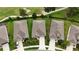 An aerial view of a single-story home located in a well-manicured community and close to a golf course at 17727 Garsalaso Cir, Brooksville, FL 34604