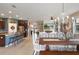 Charming dining room that flows into the kitchen and living areas, featuring stylish decor and abundant natural light at 17727 Garsalaso Cir, Brooksville, FL 34604