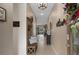 Inviting hallway with stylish decor, wood accents, and a welcoming ambiance at 17727 Garsalaso Cir, Brooksville, FL 34604