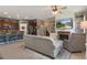 Inviting open-concept living space that flows seamlessly into the dining and kitchen area, perfect for entertaining at 17727 Garsalaso Cir, Brooksville, FL 34604