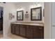Main bathroom features a double vanity with a large walk-in closet at 17727 Garsalaso Cir, Brooksville, FL 34604