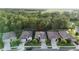 This aerial view shows the property's location within a community surrounded by trees and green spaces at 17843 Garsalaso Cir, Brooksville, FL 34604