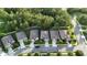 This aerial view showcases the property's location within a community surrounded by green spaces and manicured grounds at 17843 Garsalaso Cir, Brooksville, FL 34604