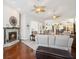 Cozy living room showcasing fireplace, comfy seating, and open layout at 18845 Fairway Green Dr, Hudson, FL 34667