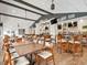 A restaurant featuring tables, chairs, and a well-stocked bar at 18845 Fairway Green Dr, Hudson, FL 34667