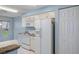 Charming kitchen with ample cabinetry, appliances, and a view to the outdoors at 2165 Springmeadow Dr, Spring Hill, FL 34606