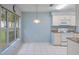 Eat-in kitchen with tile flooring, granite counters, and lots of natural light at 2165 Springmeadow Dr, Spring Hill, FL 34606