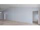 Bright living room featuring vaulted ceiling and neutral carpet at 2165 Springmeadow Dr, Spring Hill, FL 34606