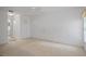 Large main bedroom with neutral carpet and ceiling fan at 2165 Springmeadow Dr, Spring Hill, FL 34606