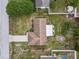 Aerial view of the home's roof and backyard at 2450 Ambassador Ave, Spring Hill, FL 34609