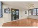 Sunroom with tile floors, sliding glass doors, a ceiling fan, and exterior views at 2450 Ambassador Ave, Spring Hill, FL 34609