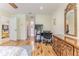 Bedroom featuring a hardwood floor, an office desk, and an interior view at 2481 Whispering Pines Ct, Spring Hill, FL 34606