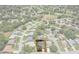 Overhead image outlining property lines, highlighting its location within a lush, green neighborhood at 2486 Deer Trail Ln, Spring Hill, FL 34606