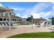 Beautiful community pool area with ample seating, brick pavers, and a well-maintained pool at 2486 Deer Trail Ln, Spring Hill, FL 34606