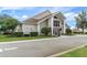 Exterior view of the Performing Arts Center with well-kept landscaping and elegant architectural details at 2486 Deer Trail Ln, Spring Hill, FL 34606