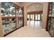 Spacious lobby featuring tile flooring, display cases and large windows, enhancing the community building's aesthetic appeal at 2542 Sandy Hill Ct, Holiday, FL 34691