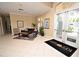 Bright lobby area featuring a comfortable seating and a welcoming atmosphere for residents and guests at 2542 Sandy Hill Ct, Holiday, FL 34691