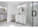 Stylish bathroom featuring double vanities, and a glass door shower at 27091 Country Oak Dr, Brooksville, FL 34602