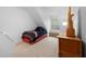 Cozy bedroom with natural light from a window and a bed with stylish bedding at 27091 Country Oak Dr, Brooksville, FL 34602