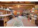 Bonus room featuring ample space, shelving units, and bright overhead lighting at 27091 Country Oak Dr, Brooksville, FL 34602