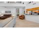 Open concept living room with breakfast bar pass through into kitchen area at 27091 Country Oak Dr, Brooksville, FL 34602