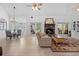 Open floor plan featuring bright dining space with adjacent fireplace sitting area at 27091 Country Oak Dr, Brooksville, FL 34602