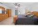 A main bedroom features wood floors, ceiling fan, and access to the bathroom at 27091 Country Oak Dr, Brooksville, FL 34602
