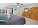 This spacious main bedroom features a closet, and wood floors at 27091 Country Oak Dr, Brooksville, FL 34602