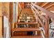 Wood staircase leading to upper level of a home at 27091 Country Oak Dr, Brooksville, FL 34602