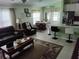 Inviting living room featuring a cozy seating area and lots of natural light at 2930 Plantain Dr, Holiday, FL 34691