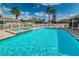 Sparkling pool and spa area with comfortable lounge chairs, perfect for relaxation and social gatherings at 2930 Plantain Dr, Holiday, FL 34691