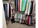 Walk-in closet providing ample shelving and hanging storage for an organized wardrobe at 2930 Plantain Dr, Holiday, FL 34691