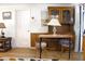 Charming dining area featuring wood table, chairs, and cabinet at 3151 Wellington Dr, Holiday, FL 34691