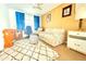Cozy living room featuring wood-paneled walls, and a comfortable sofa at 3151 Wellington Dr, Holiday, FL 34691